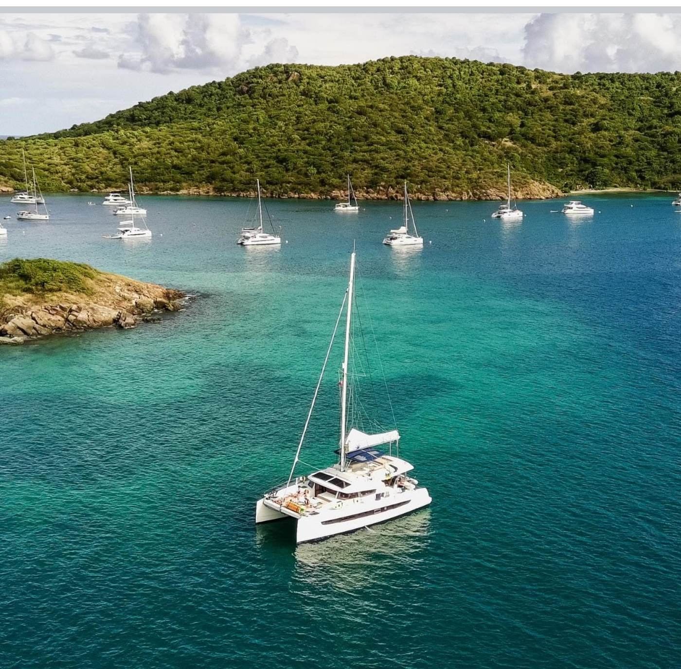 Aerial view of Ne Plus Ultra at anchor among other yachts in a British Virgin Islands bay