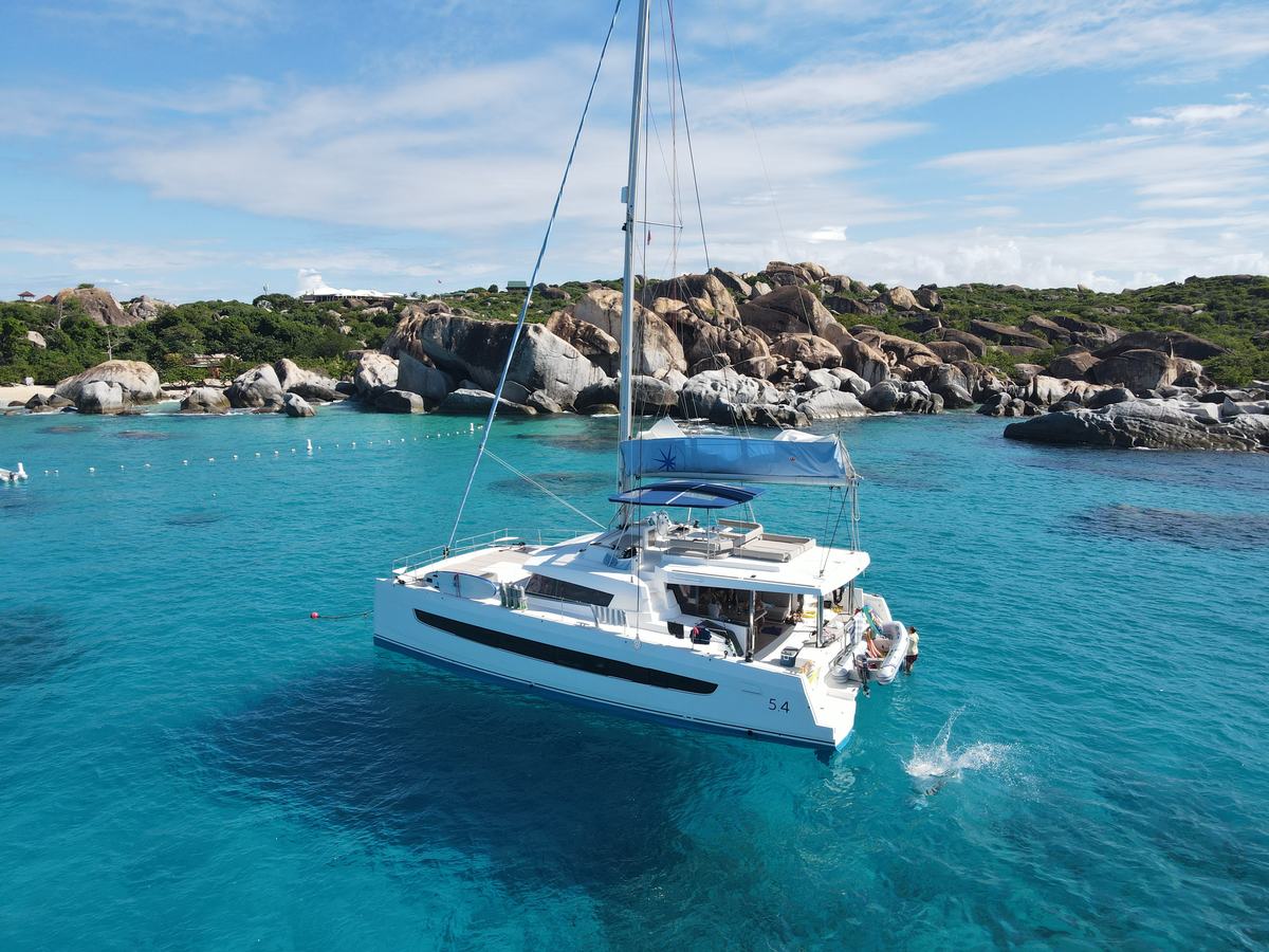 Aerial photo of the turquoise anchorage at The Baths, Virgin Gorda, seen from above Ne Plus Ultra